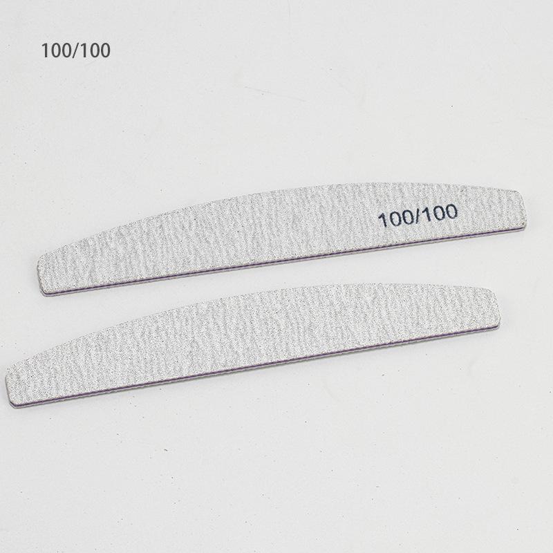 Double-Sided Matte Gray Half-Moon Nail File for Polishing.
Double-Sided Matte Gray Half-Moon Nail File for Polishing.