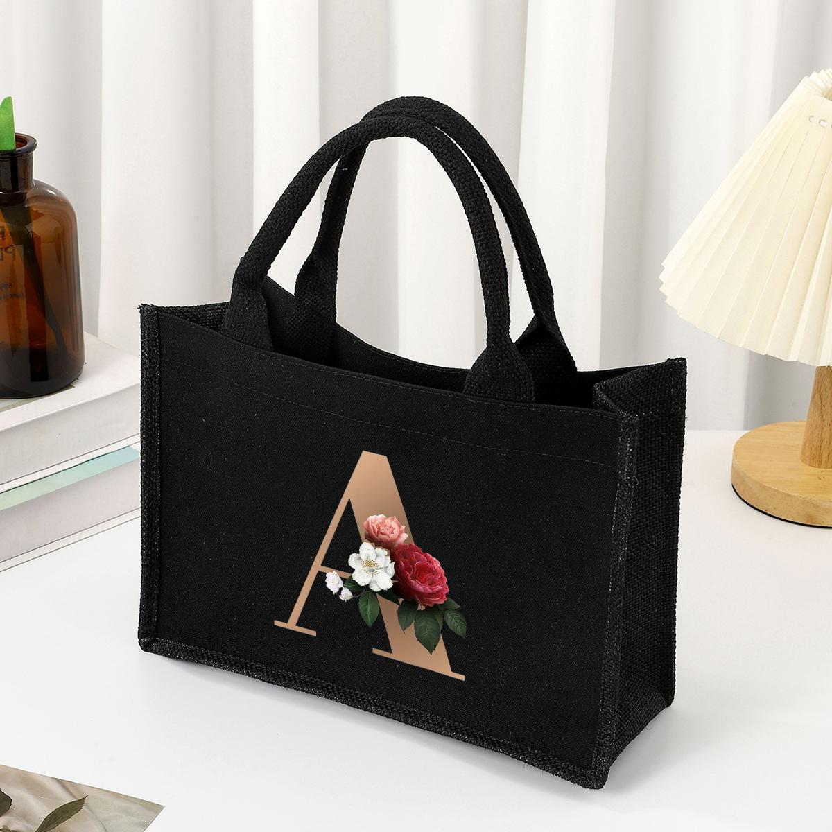 Black hand-held canvas bag, 26 letter printed women s handbag, large capacity portable leisure beach bag, indoor waterproof
Black hand-held canvas bag, 26 letter printed women s handbag, large capacity portable leisure beach bag, indoor waterproof