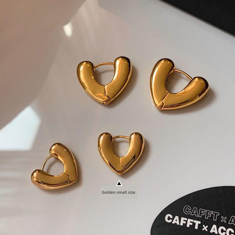 Caffti European and American Style Gold and Silver Heart-Shaped Earrings for Women, Niche Design, 2026 New Model, High-End Ear Cuffs and Earrings Golden Trumpet
Caffti European and American Style Gold and Silver Heart-Shaped Earrings for Women, Niche Design, 2026 New Model, High-End Ear Cuffs and Earrings Golden Trumpet