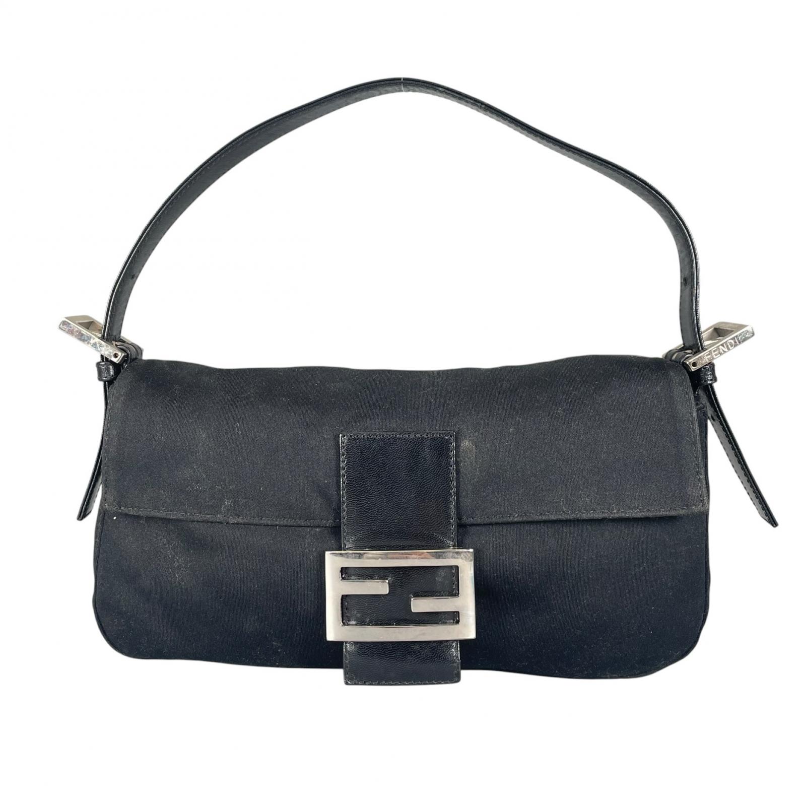 FENDI Mamma baguette Сумка чорна Жіноча вживана
FENDI Mamma baguette Сумка чорна Жіноча вживана