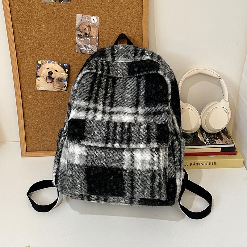 plaid junior high school student schoolbag female Korean version literary and artistic style college student commuting backpack
plaid junior high school student schoolbag female Korean version literary and artistic style college student commuting backpack