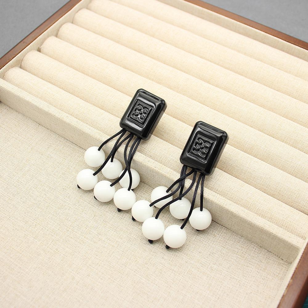 MONIES High-End Women s Wood Tassel & Glass Bead Long Earrings
MONIES High-End Women s Wood Tassel & Glass Bead Long Earrings