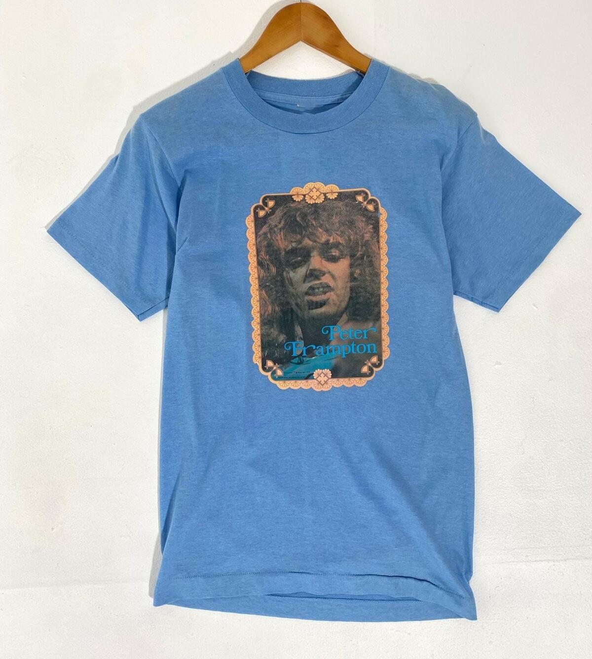 1976 Peter Frampton Shirt Classic Light Blue Unisex S-2345XL 2B0034 Unisex T-Shirt XXL
1976 Peter Frampton Shirt Classic Light Blue Unisex S-2345XL 2B0034 Unisex T-Shirt XXL