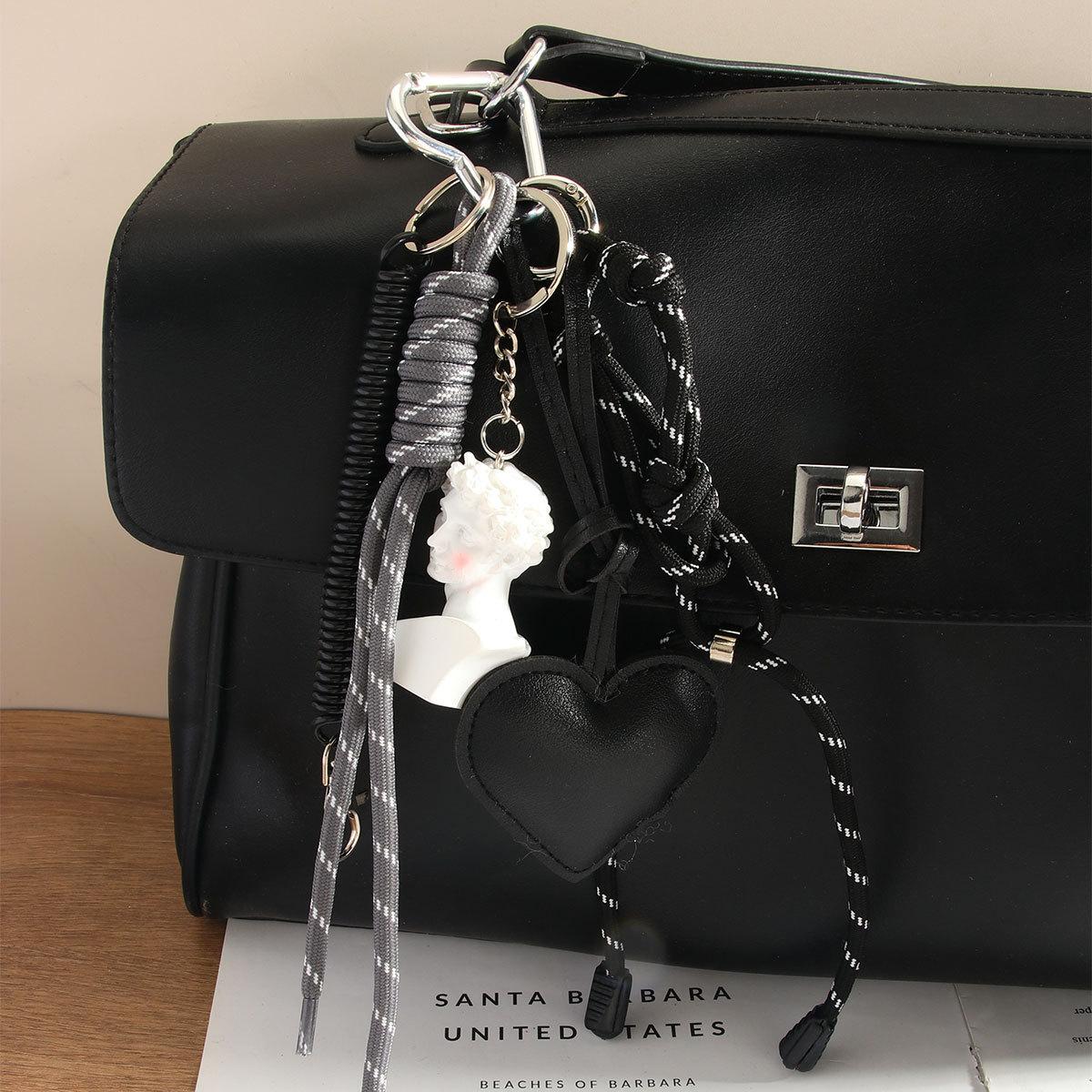 Simple art blush David statue pendant black pu love pearl chain premium bag pendant
Simple art blush David statue pendant black pu love pearl chain premium bag pendant