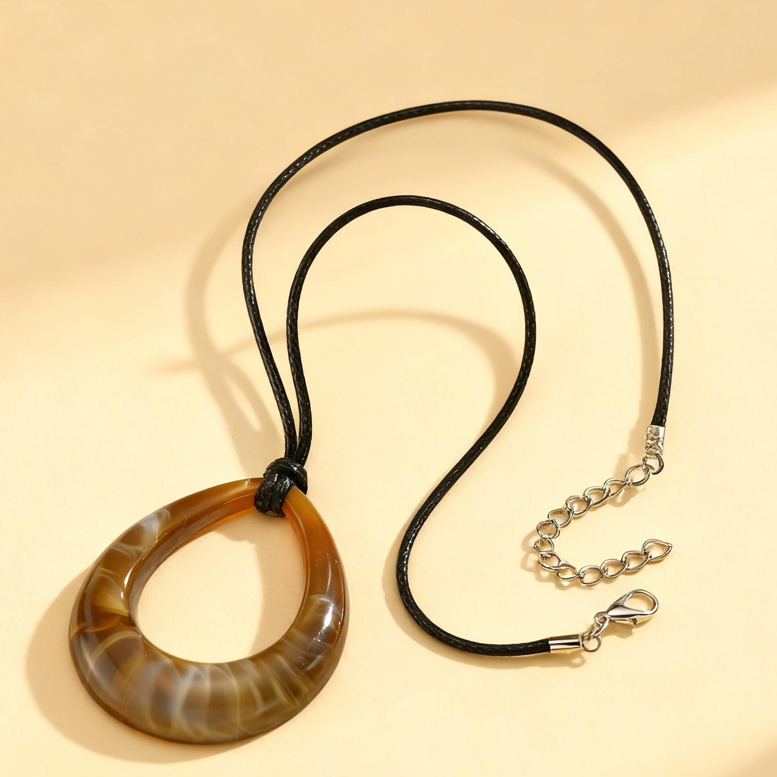 Vintage Amber Resin Geometric Pendant for Women,Ball Hollow U-Ring Wax Chain Rope Necklaces,Simple Charm Sweater Jewelry Gifts
Vintage Amber Resin Geometric Pendant for Women,Ball Hollow U-Ring Wax Chain Rope Necklaces,Simple Charm Sweater Jewelry Gifts