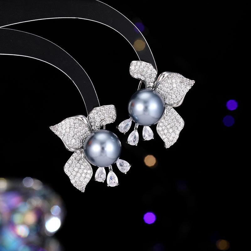Ladies Light Luxury Design Elegant Flower Imitation Pearl Earrings Fashionable and Versatile Unique Design Sense Earrings
Ladies Light Luxury Design Elegant Flower Imitation Pearl Earrings Fashionable and Versatile Unique Design Sense Earrings