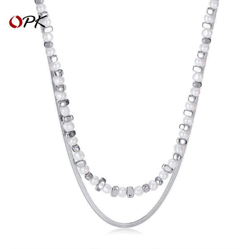 High-End Women s Stainless Steel Necklace with Black Hematite, Pearl, and Double Layered Snake Bone Chain
High-End Women s Stainless Steel Necklace with Black Hematite, Pearl, and Double Layered Snake Bone Chain