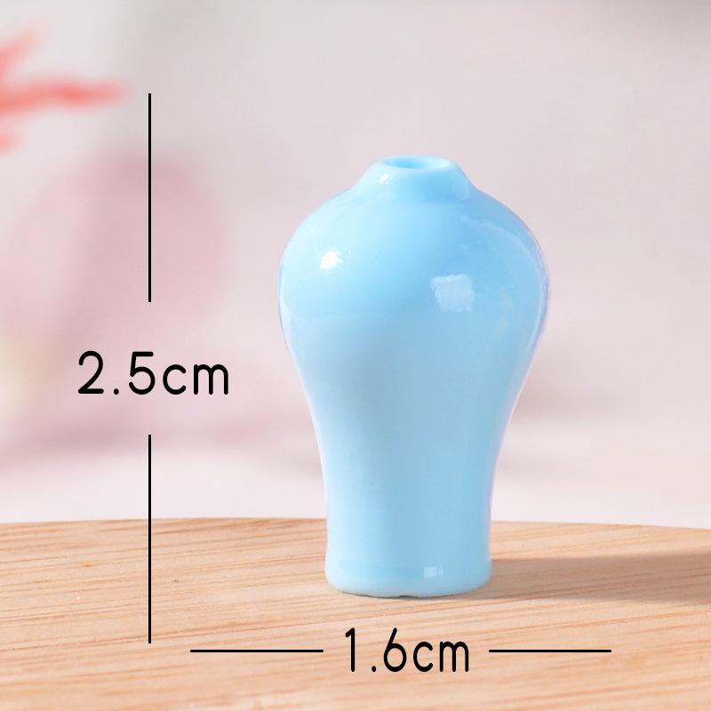 Маленькие цветочные вазы Микро-ландшафтные фарфоровые вазы Смоляные модели Маленькие украшения Реквизит для сцены Meiping
Маленькие цветочные вазы Микро-ландшафтные фарфоровые вазы Смоляные модели Маленькие украшения Реквизит для сцены Meiping