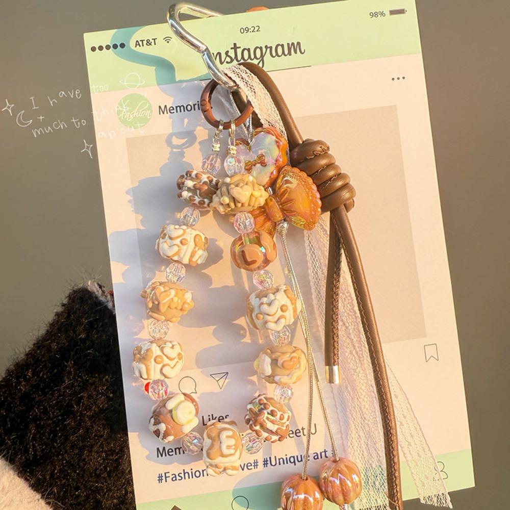Fashion Bowknot Leather Rope Keychain Beaded Rope Mobile Phone Lanyard Hand-painted Y2K Bag Pendant Ornaments Gifts хакі
Fashion Bowknot Leather Rope Keychain Beaded Rope Mobile Phone Lanyard Hand-painted Y2K Bag Pendant Ornaments Gifts хакі