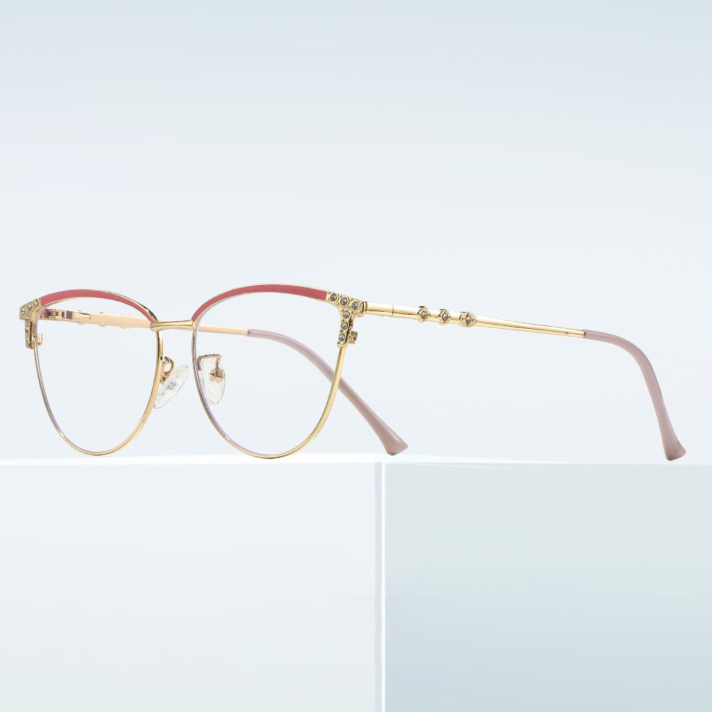 Cat-Eye Rhinestone Glasses: Fashionable Anti-Blue Light Metal Frame with Spring Temples, Photochromic and Plano Options for Women.
Cat-Eye Rhinestone Glasses: Fashionable Anti-Blue Light Metal Frame with Spring Temples, Photochromic and Plano Options for Women.