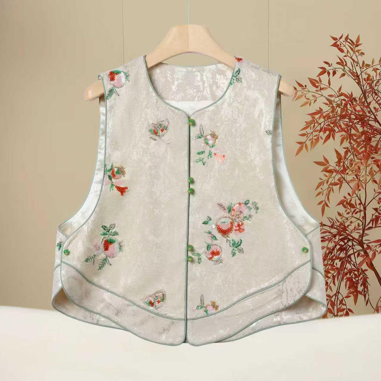 Pomegranate Sequin Embroidered Chinese-Style Jacquard Vest with Pearl Buttons and Shoulder Cape 2XL 140-160 cm абрикосовий
Pomegranate Sequin Embroidered Chinese-Style Jacquard Vest with Pearl Buttons and Shoulder Cape 2XL 140-160 cm абрикосовий
