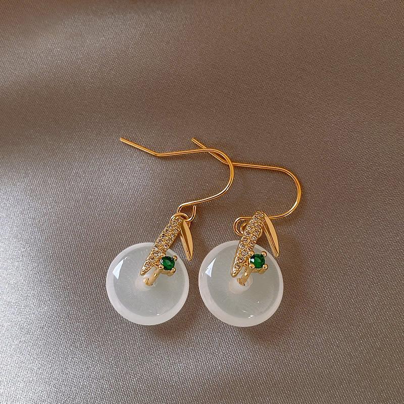 Round zircon earrings exquisite elegance temperament ear hook high-end simple earrings
Round zircon earrings exquisite elegance temperament ear hook high-end simple earrings