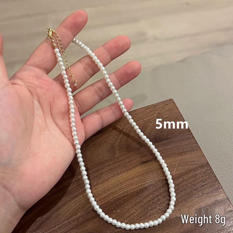 Elegant Faux Pearl Layered Necklace for Women - Versatile Clavicle and Sweater Chain
Elegant Faux Pearl Layered Necklace for Women - Versatile Clavicle and Sweater Chain