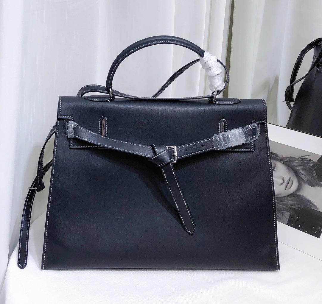 Верхній шар Fubao Saddle leather суперм’яка шкіряна складна сумка-клатч преміум-класу для жінок 35x13x25cm чорний
Верхній шар Fubao Saddle leather суперм’яка шкіряна складна сумка-клатч преміум-класу для жінок 35x13x25cm чорний