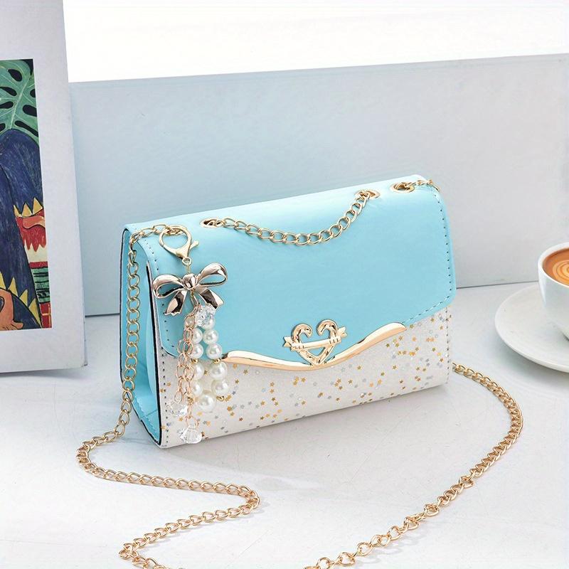 Festive Mini Shoulder Bag with Sparkling Details - PU Material, Lightweight, Adjustable Strap, and Magnetic Closure
Festive Mini Shoulder Bag with Sparkling Details - PU Material, Lightweight, Adjustable Strap, and Magnetic Closure
