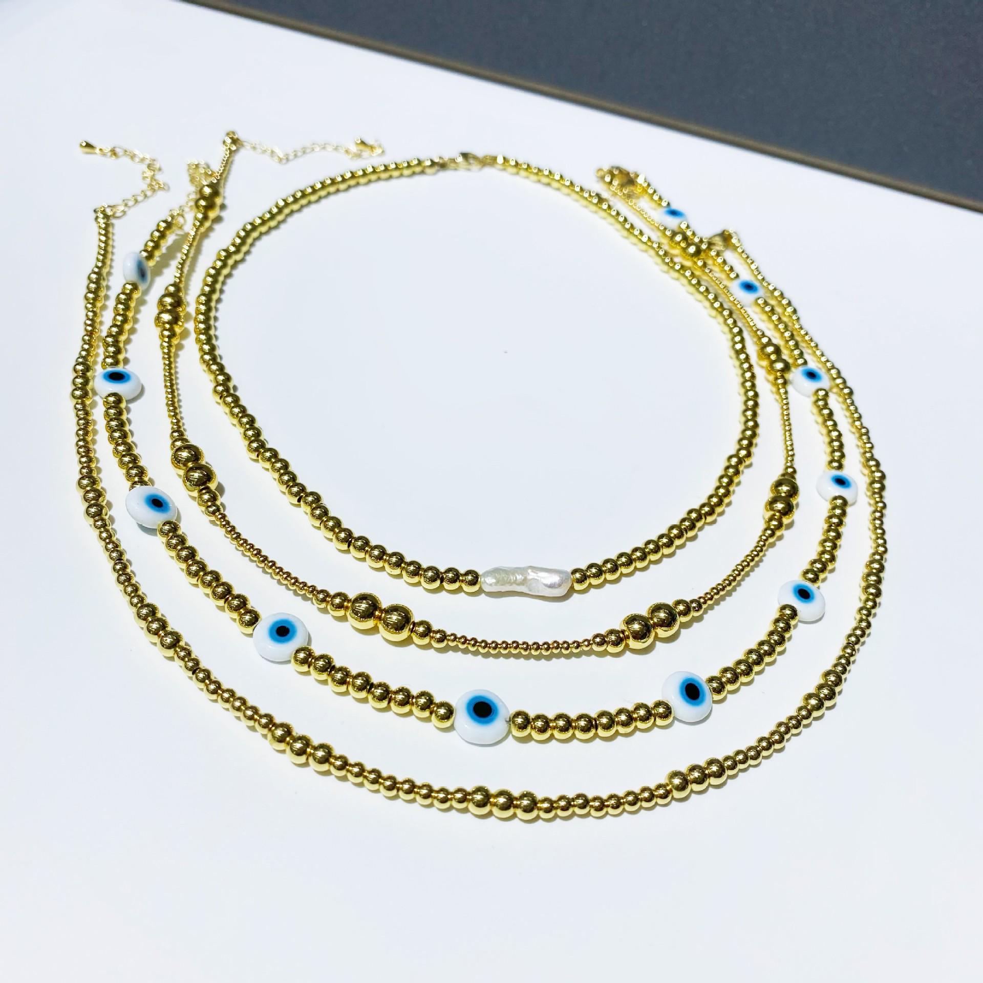 European and American Style Natural Pearl Glass Eye Necklace with Real Gold-Plated Copper Beads for Women
European and American Style Natural Pearl Glass Eye Necklace with Real Gold-Plated Copper Beads for Women