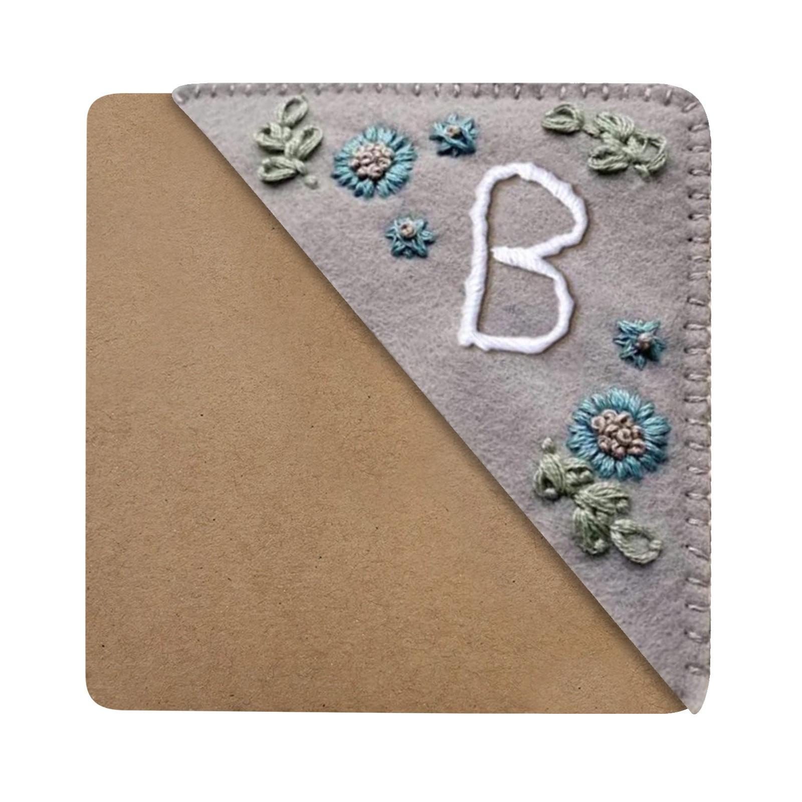 Handmade Embroidered Fabric Bookmark with Floral Pattern and Letter Design Soft Felt Material Durable Stitching for Book Lovers
Handmade Embroidered Fabric Bookmark with Floral Pattern and Letter Design Soft Felt Material Durable Stitching for Book Lovers