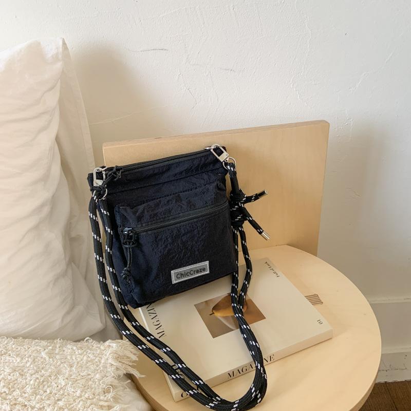 Summer Summer Lightweight Mobile Phone Crossbody Bag Women s Nylon Cloth Lightweight Casual Super Fire Small Square Bag чорний
Summer Summer Lightweight Mobile Phone Crossbody Bag Women s Nylon Cloth Lightweight Casual Super Fire Small Square Bag чорний