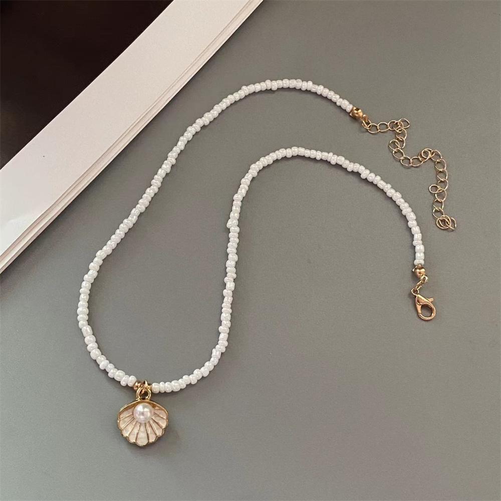 Imitation Pearl Shell Necklace for Girl Women Handmade Seed Beads Chain Necklace Cute Romantic Pendant Neck Zircon
Imitation Pearl Shell Necklace for Girl Women Handmade Seed Beads Chain Necklace Cute Romantic Pendant Neck Zircon