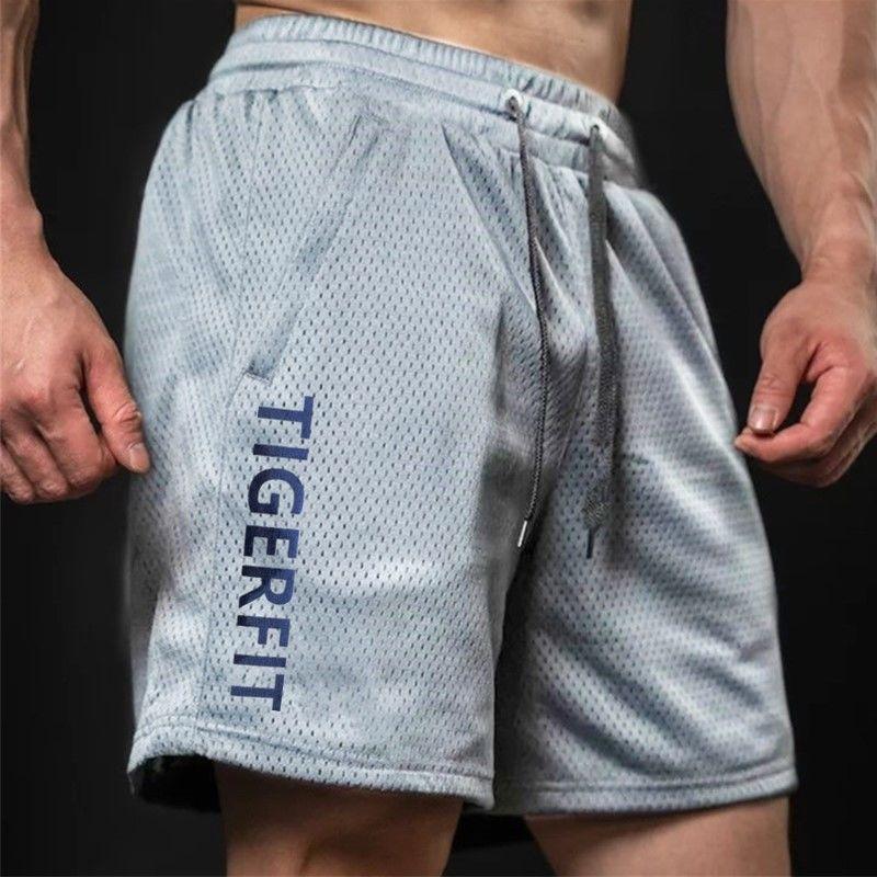 Мужские спортивные шорты из быстросохнущей сетки для фитнеса, летние, для бега, тренировок, свободные, повседневные, большого размера, с пятью точками M
Мужские спортивные шорты из быстросохнущей сетки для фитнеса, летние, для бега, тренировок, свободные, повседневные, большого размера, с пятью точками M