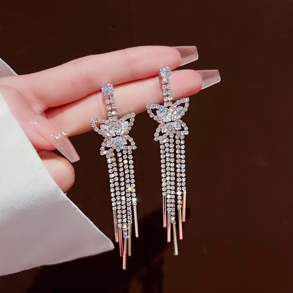 Korean Sparkly Butterfly Tassel Earrings - 2025 Trendy Exaggerated Dangle for Women
Korean Sparkly Butterfly Tassel Earrings - 2025 Trendy Exaggerated Dangle for Women