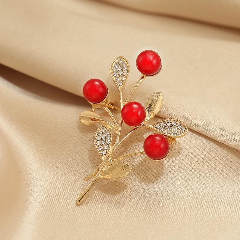 Red brooch, high-end female design sense, niche corsage temperament, pin, clothes, suits and accessories
Red brooch, high-end female design sense, niche corsage temperament, pin, clothes, suits and accessories