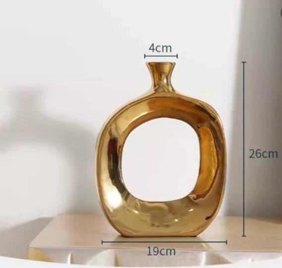 Скандинавская керамическая золотая ваза для цветов – Уникальное украшение для дома и современное настольное изделие Size S 26x19cm
Скандинавская керамическая золотая ваза для цветов – Уникальное украшение для дома и современное настольное изделие Size S 26x19cm
