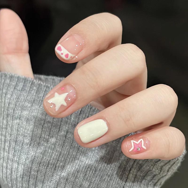 Sweet Milky White Press-On Nails with Short Length and Cartoon Star Designs Gold-plated Sealant Glue Kit
Sweet Milky White Press-On Nails with Short Length and Cartoon Star Designs Gold-plated Sealant Glue Kit