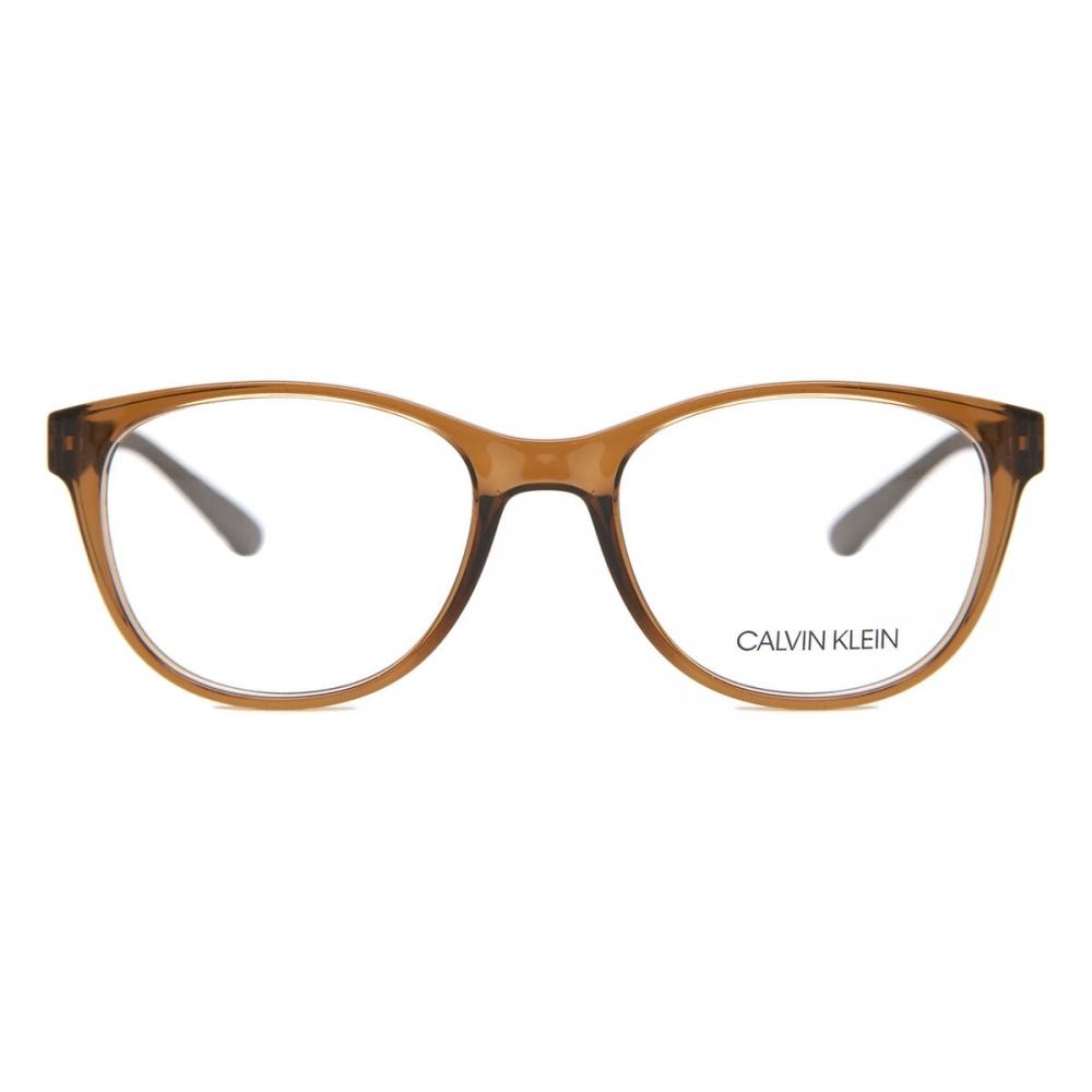 Ck19572 281 Women Eyeglasses Crystal Amber Brown/52-18-145
Ck19572 281 Women Eyeglasses Crystal Amber Brown/52-18-145