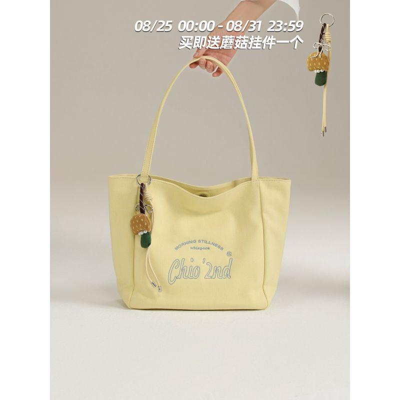 South Style Chio2nd Just Tote Bag Simple Printed Canvas Bag Women Large Capacity Portable Shoulder Bag Goose yellow
South Style Chio2nd Just Tote Bag Simple Printed Canvas Bag Women Large Capacity Portable Shoulder Bag Goose yellow