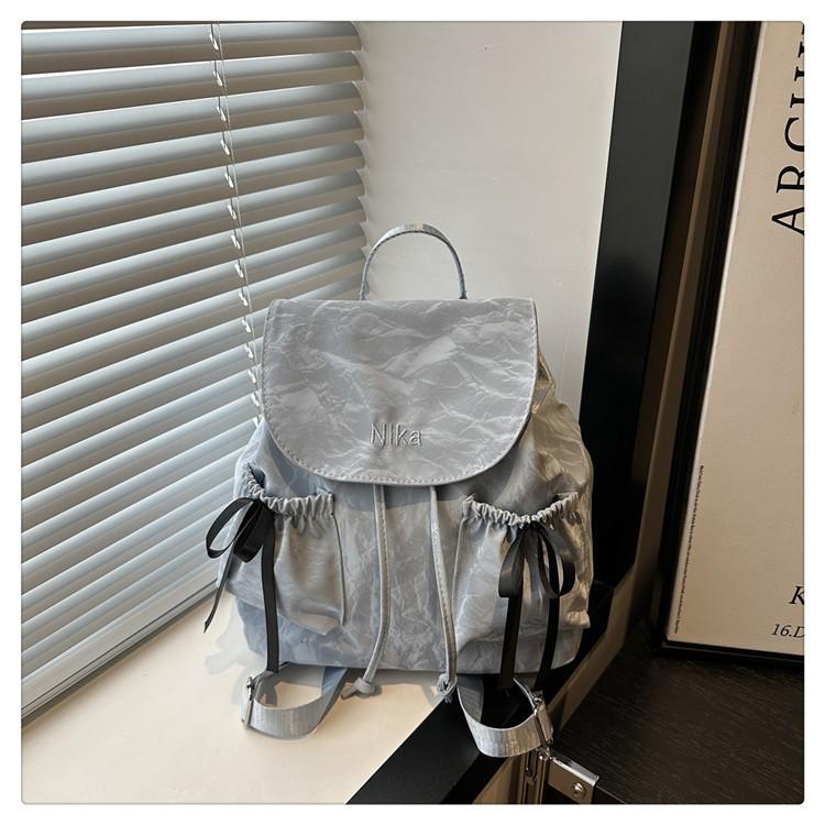 Рюкзак из нейлонового холста с бантом - Женская стильная дорожная сумка большой вместимости серебряный
Рюкзак из нейлонового холста с бантом - Женская стильная дорожная сумка большой вместимости серебряный