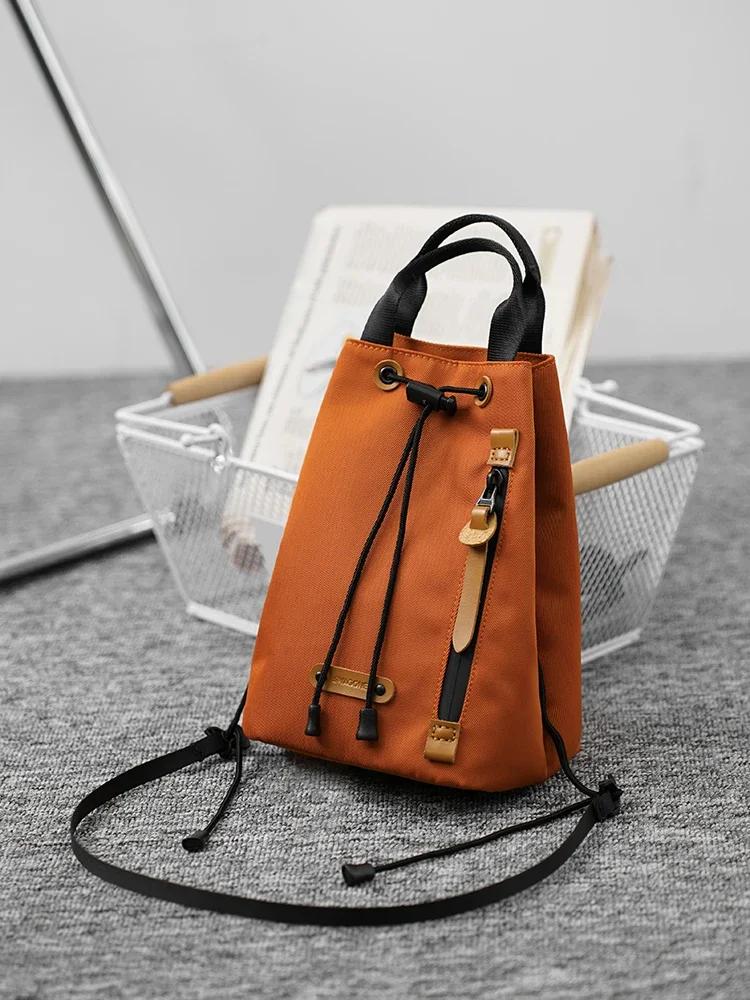 Summer New Youth Texture Trendy Mobile Phone Bag Versatile Casual Single Shoulder Bags Hot Sale Drawstring Bucket Crossbody Bag помаранчевий
Summer New Youth Texture Trendy Mobile Phone Bag Versatile Casual Single Shoulder Bags Hot Sale Drawstring Bucket Crossbody Bag помаранчевий