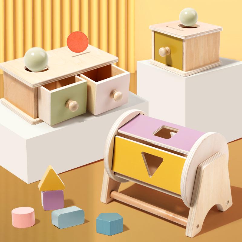 Montessori Educational Toy Set: Wooden Drawer, Coin, and Ball Toss Box for Early Science and Intellectual Development.
Montessori Educational Toy Set: Wooden Drawer, Coin, and Ball Toss Box for Early Science and Intellectual Development.