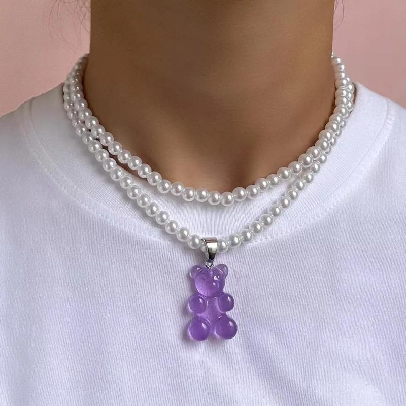 New Clear Candy Bear Pendant Beaded Necklace with Multiple Layers of Imitation Pearls Fashion Jewellery for Men and Women
New Clear Candy Bear Pendant Beaded Necklace with Multiple Layers of Imitation Pearls Fashion Jewellery for Men and Women