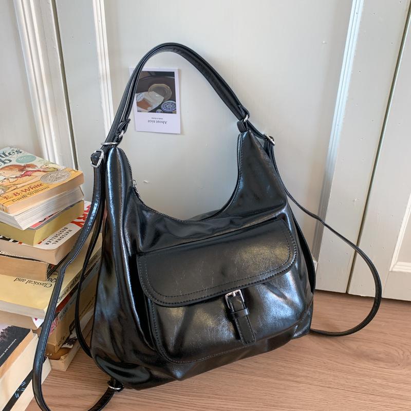 Вместительная сумка-пельмень для поездок на работу, женская летняя новинка, нишевая сумка через плечо для отдыха, многофункциональный рюкзак чёрный