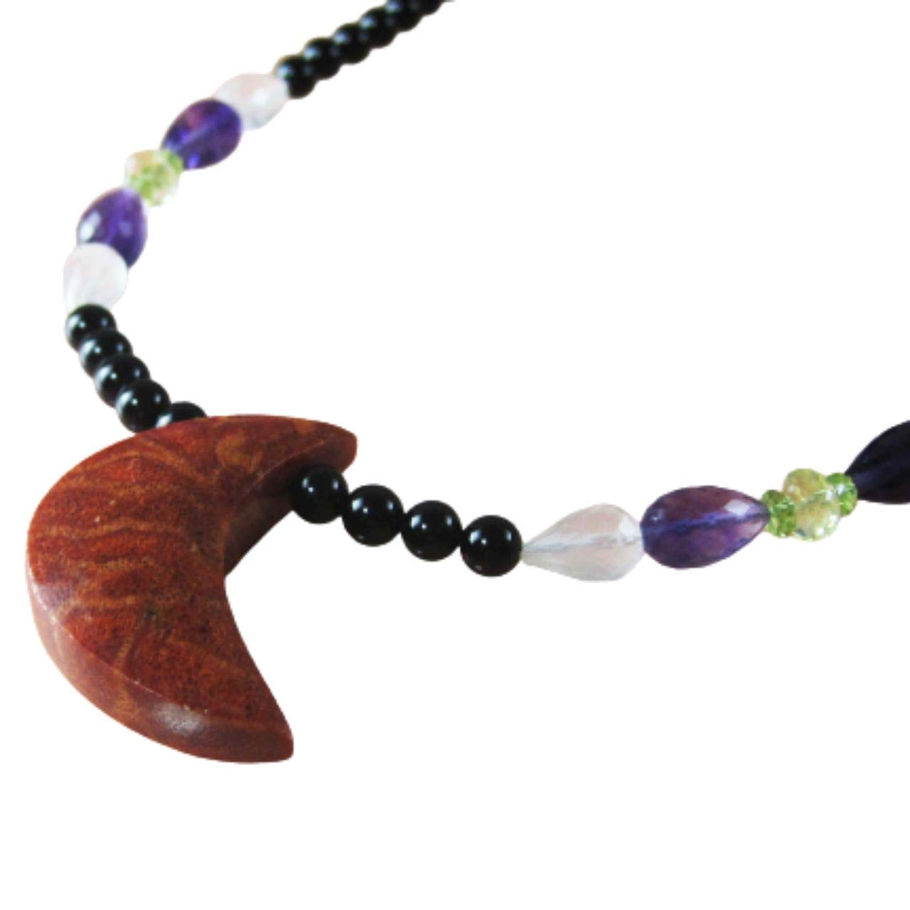 Large African coral necklace with a crescent moon coral pendant, amethyst, peridot, rose quartz, and onyx. Length: 52 cm. Silver findings.
Large African coral necklace with a crescent moon coral pendant, amethyst, peridot, rose quartz, and onyx. Length: 52 cm. Silver findings.