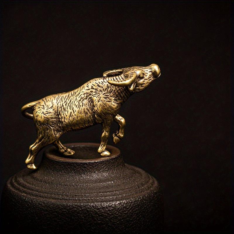 1Pc Antique Bronze Indian Cattle Statue Solid Copper Bull Keychain Pendant Figurines Ornaments Miniatures Feng Shui Home Decor
1Pc Antique Bronze Indian Cattle Statue Solid Copper Bull Keychain Pendant Figurines Ornaments Miniatures Feng Shui Home Decor