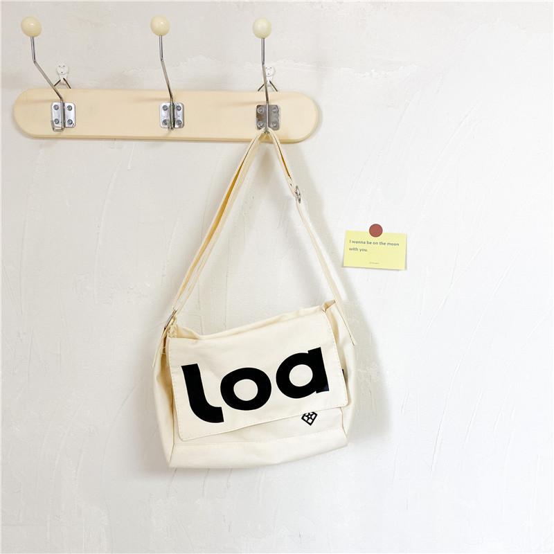 Stylish Canvas Children s Crossbody Bag With Unique Letter Design For Boys And Girls Ideal For Everyday Use білий
Stylish Canvas Children s Crossbody Bag With Unique Letter Design For Boys And Girls Ideal For Everyday Use білий