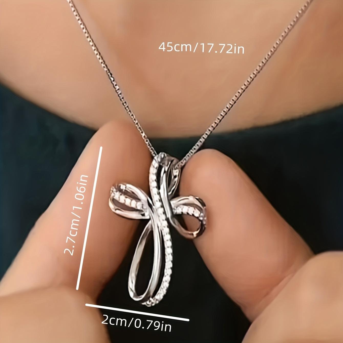 Элегантное ожерелье с подвеской в виде креста Infinity Loop с синтетическим кубическим цирконием для женщин, универсальное украшение на все времена года для повседневной носки и банкетов серебряный
Элегантное ожерелье с подвеской в виде креста Infinity Loop с синтетическим кубическим цирконием для женщин, универсальное украшение на все времена года для повседневной носки и банкетов серебряный