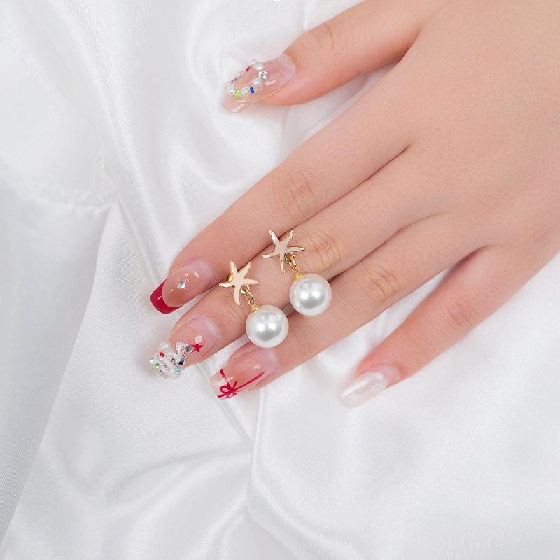Pearl stud earrings starfish decoration light luxury French classic fashion elegant daily banquet pie білий
Pearl stud earrings starfish decoration light luxury French classic fashion elegant daily banquet pie білий
