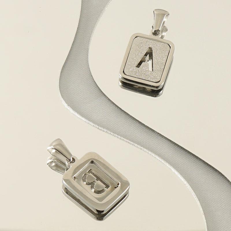 New fashion stainless steel English letter pendant, sand pressed letter model, titanium steel 18k commuting versatile
New fashion stainless steel English letter pendant, sand pressed letter model, titanium steel 18k commuting versatile