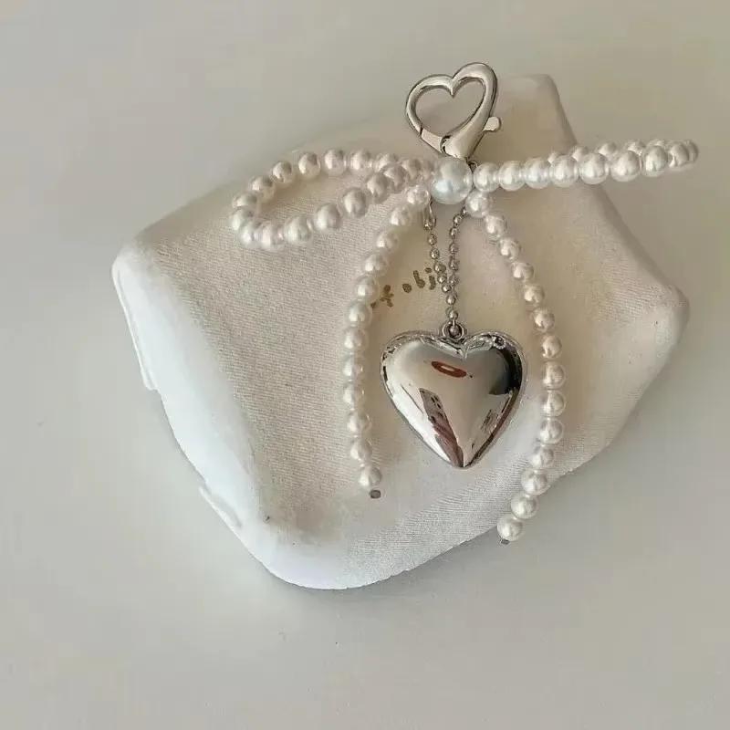 Fashion Metal Pearl Beaded Keychain Peach Heart Shape Tassel Decoration Bead Bag Chain Pendant Zircon Bag Accessories
Fashion Metal Pearl Beaded Keychain Peach Heart Shape Tassel Decoration Bead Bag Chain Pendant Zircon Bag Accessories
