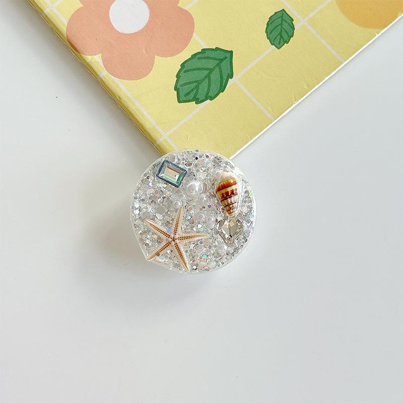 Small Fresh Ocean Starfish Snail Shell Mobile Phone Airbag Holder Paste Epoxy Round Glitter Sequin Ring Buckle
Small Fresh Ocean Starfish Snail Shell Mobile Phone Airbag Holder Paste Epoxy Round Glitter Sequin Ring Buckle