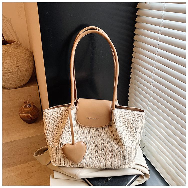 Tote bag women s large capacity new summer hand-woven straw bag shoulder holiday beach bag рожевий
Tote bag women s large capacity new summer hand-woven straw bag shoulder holiday beach bag рожевий
