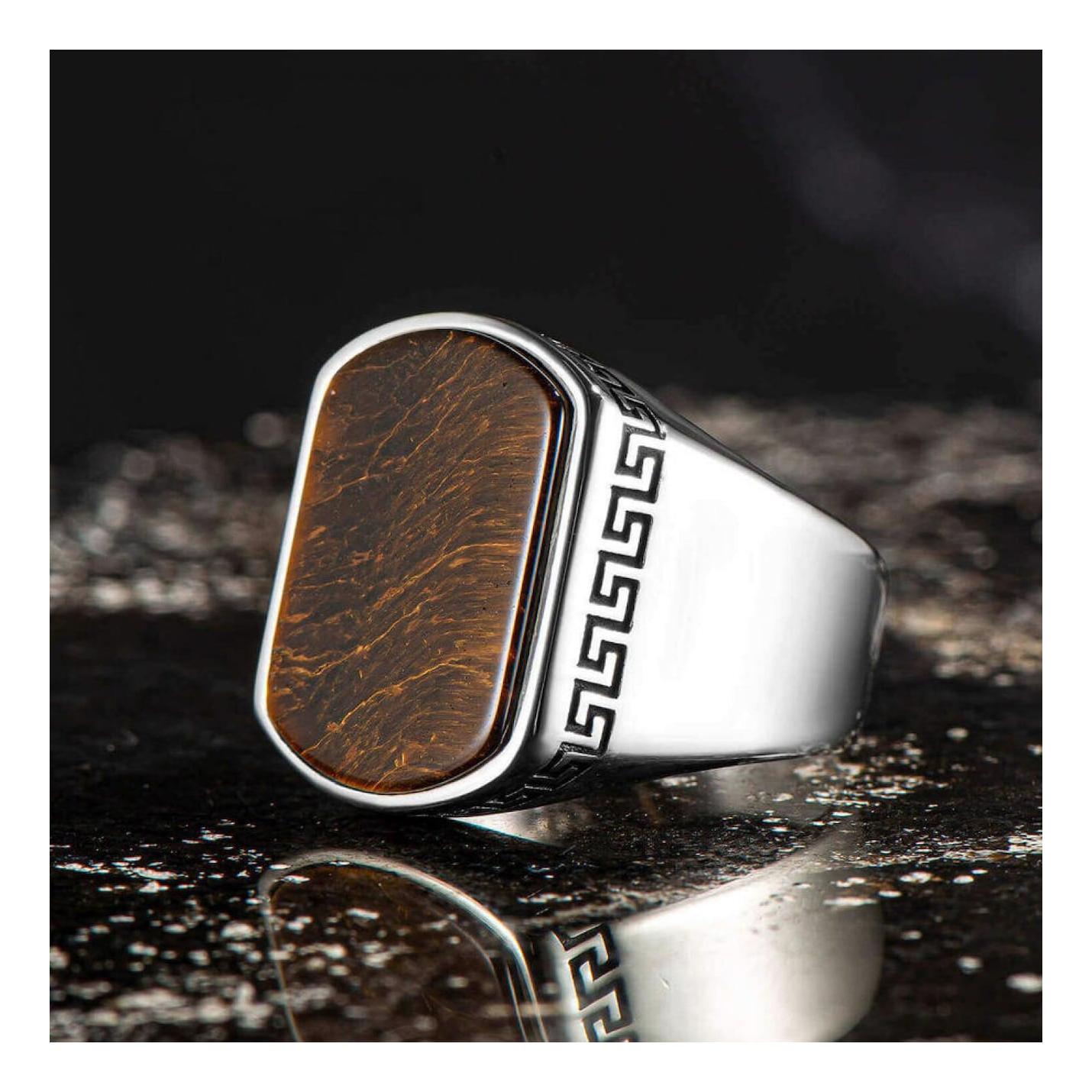 Простая модель мужское кольцо с коричневым тигровым глазом из стерлингового серебра
Простая модель мужское кольцо с коричневым тигровым глазом из стерлингового серебра