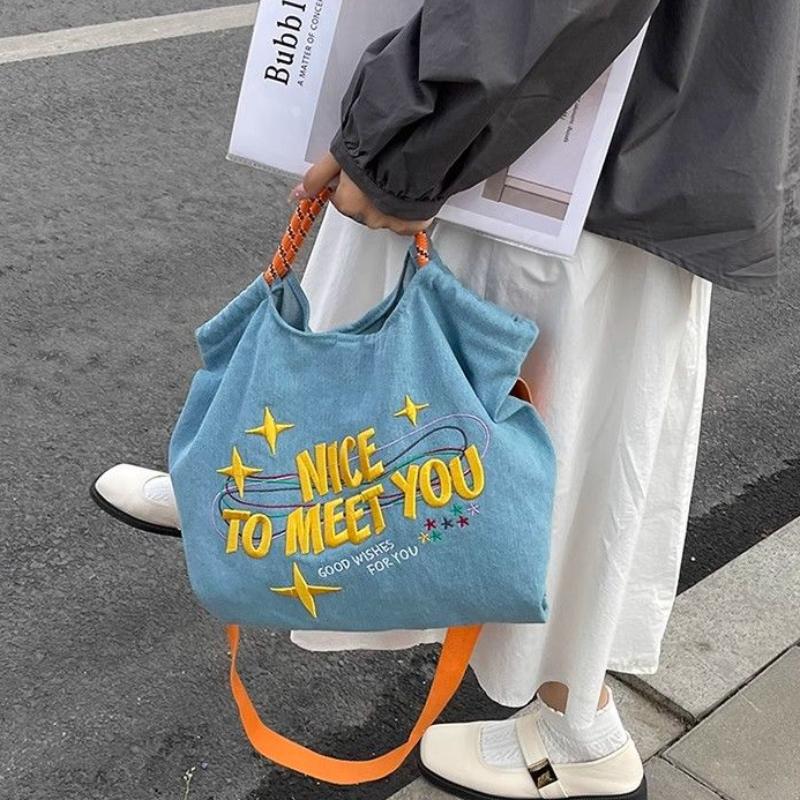 Casual Denim Tote Bag With Embroidered Letter, Multipurpose Large Capacity Crossbody Bag With Adjustable Strap,
Casual Denim Tote Bag With Embroidered Letter, Multipurpose Large Capacity Crossbody Bag With Adjustable Strap,