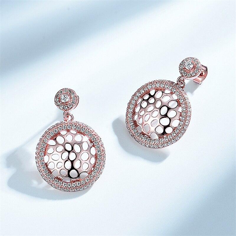 Серьги-клипсы из стерлингового серебра 925 пробы для женщин, висячие полые круглые серьги с прозрачным цирконом, трендовый подарок, классические ювелирные изделия
Серьги-клипсы из стерлингового серебра 925 пробы для женщин, висячие полые круглые серьги с прозрачным цирконом, трендовый подарок, классические ювелирные изделия
