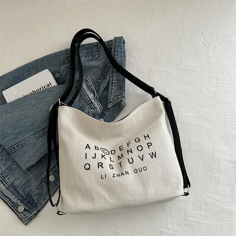 Stylish Korean Casual Letter Printed Large Capacity Canvas Tote Bag For Women In White And Black чорний
Stylish Korean Casual Letter Printed Large Capacity Canvas Tote Bag For Women In White And Black чорний