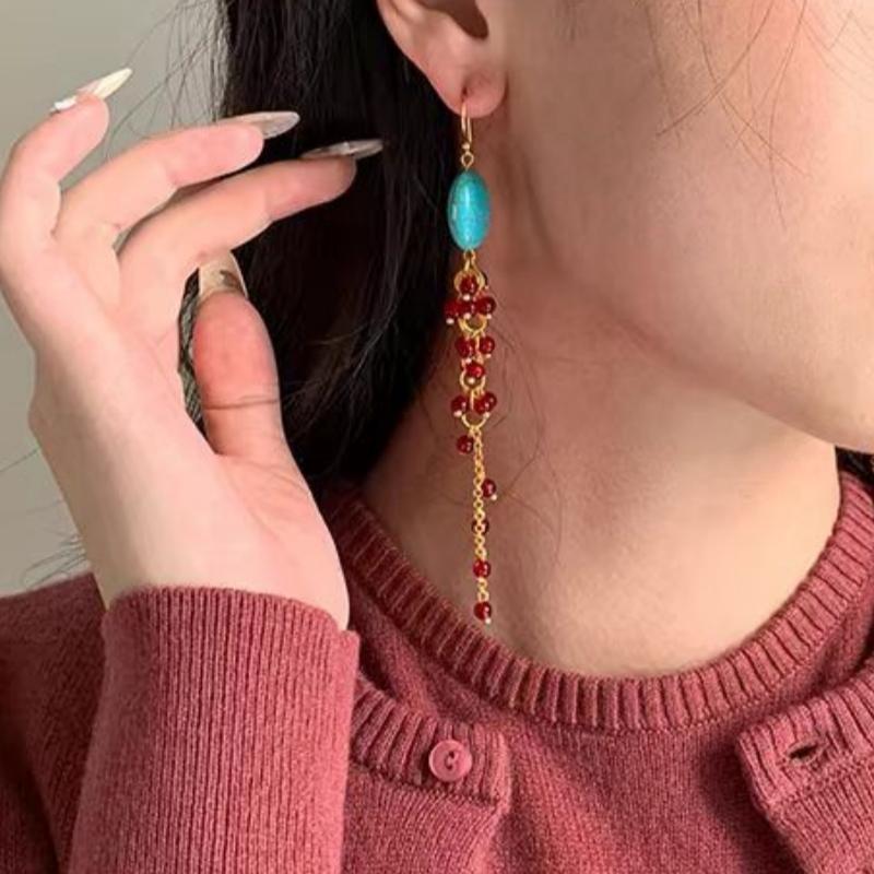 Oval tassel ear hook simple light luxury high-end earrings niche fashion exaggerated personality earrings women
Oval tassel ear hook simple light luxury high-end earrings niche fashion exaggerated personality earrings women