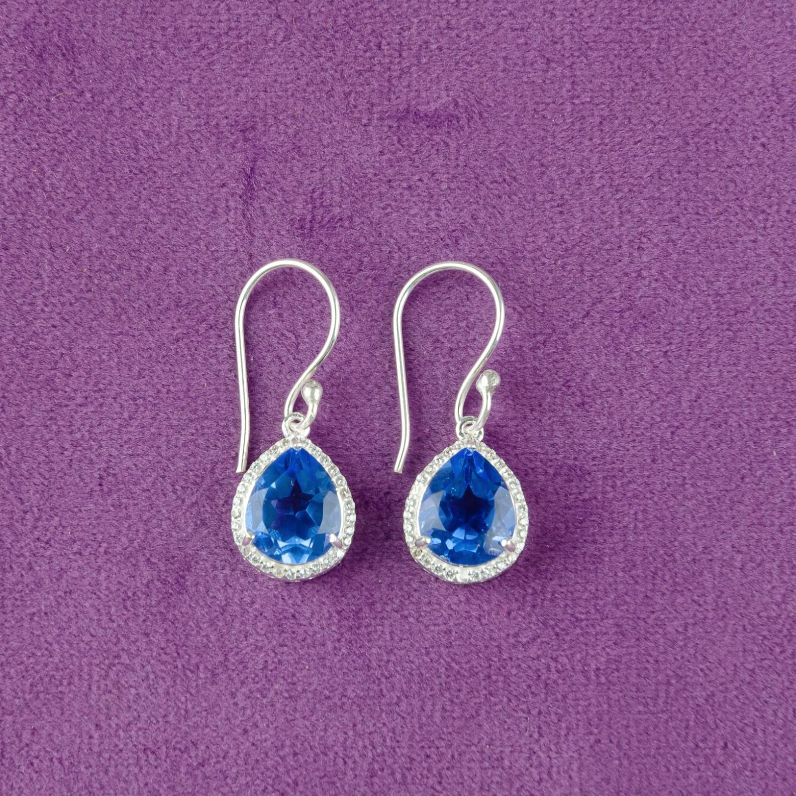 Танзанит Драгоценный камень Ювелирные изделия из стерлингового серебра 925 пробы Циркон Подвески/Серьги-подвески 1,80 CZE-4-7
Танзанит Драгоценный камень Ювелирные изделия из стерлингового серебра 925 пробы Циркон Подвески/Серьги-подвески 1,80 CZE-4-7